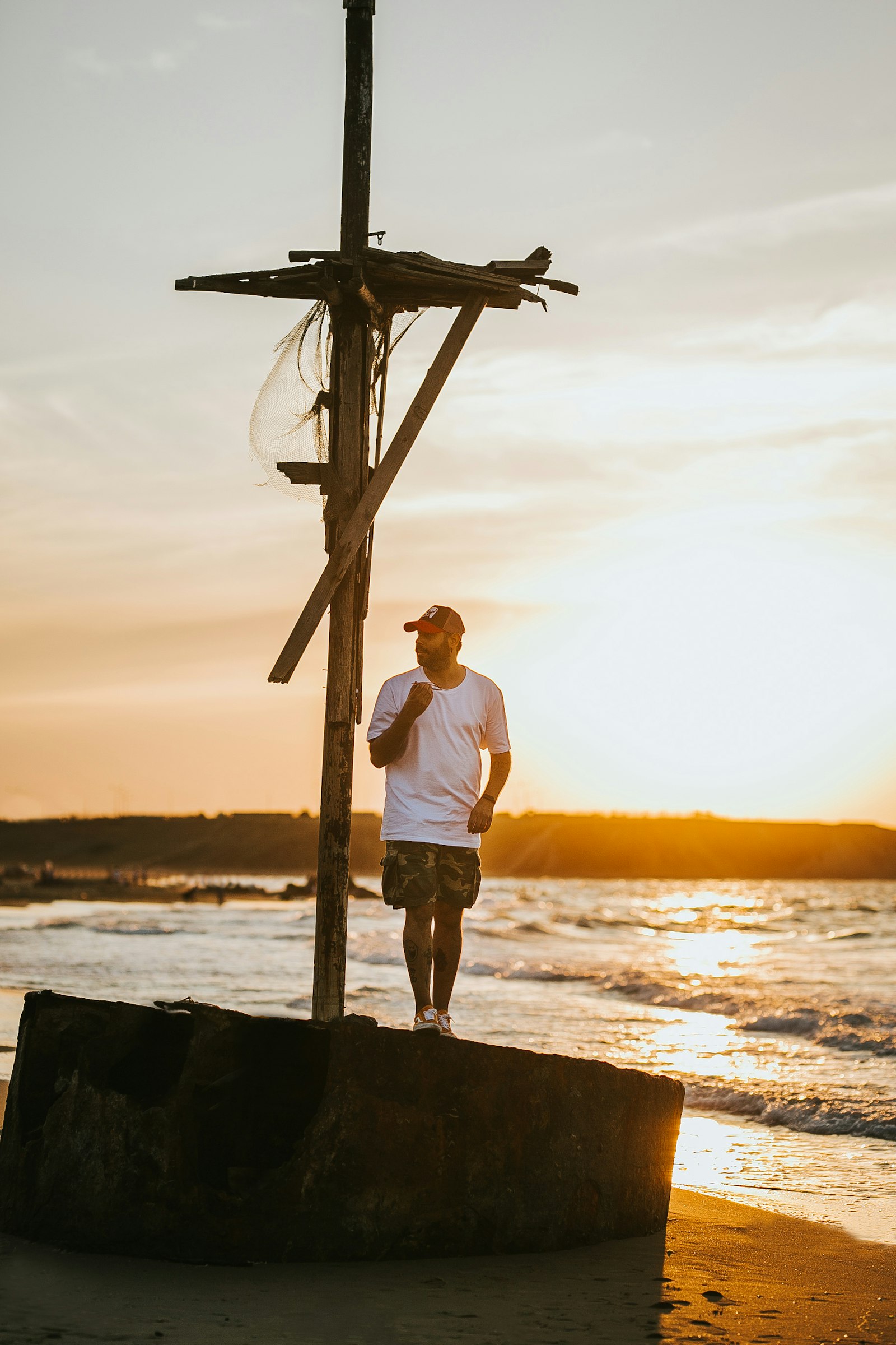 Sigma 85mm F1.4 DG HSM Art sample photo. Man standing near pavement photography