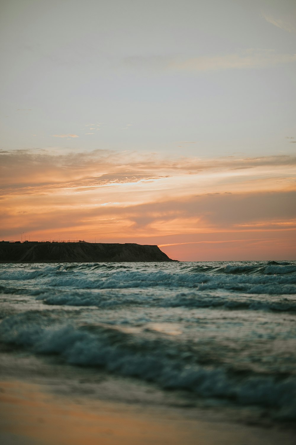 plateau near sea during golden hour