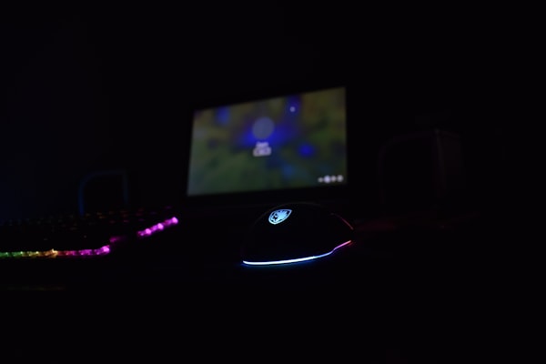 a close up of a keyboard and a monitor