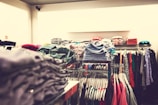 selective focus photography of hanged clothes