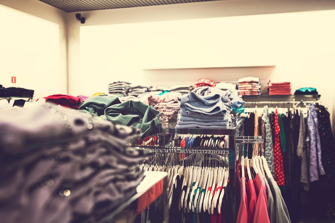 selective focus photography of hanged clothes
