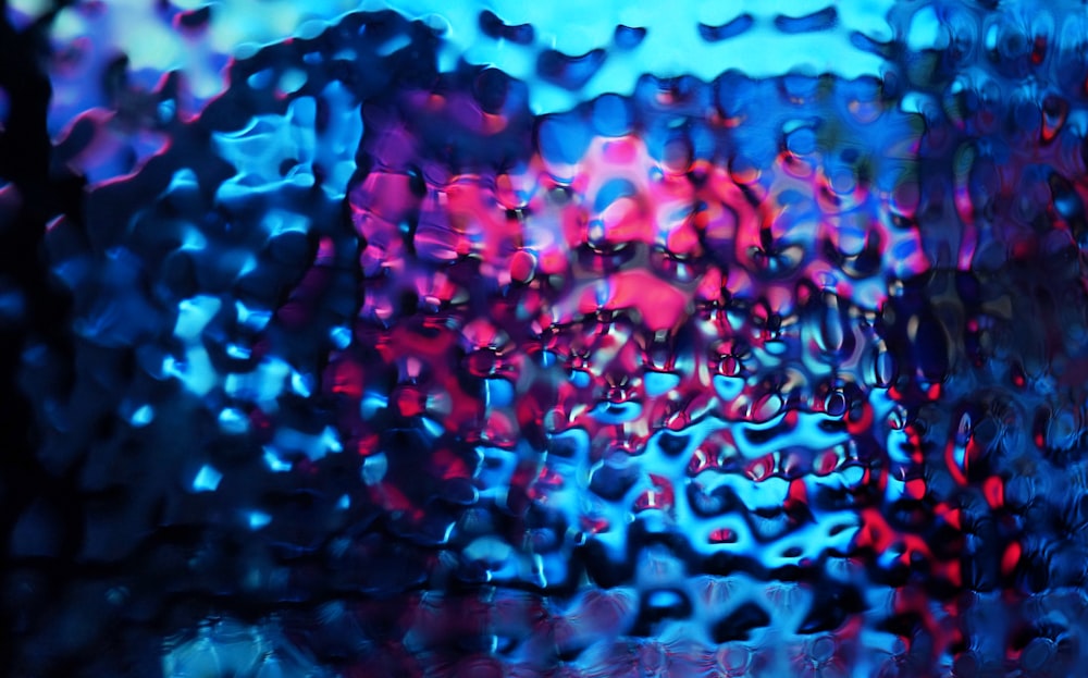 a close up of a window with rain drops