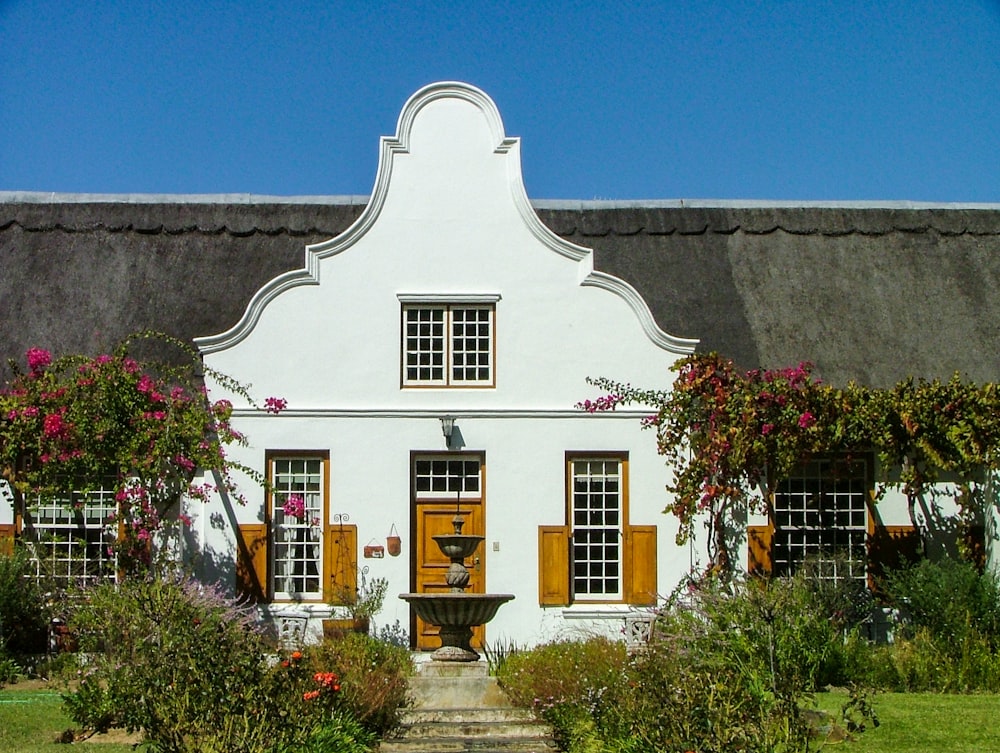 white and brown concrete house at daytime