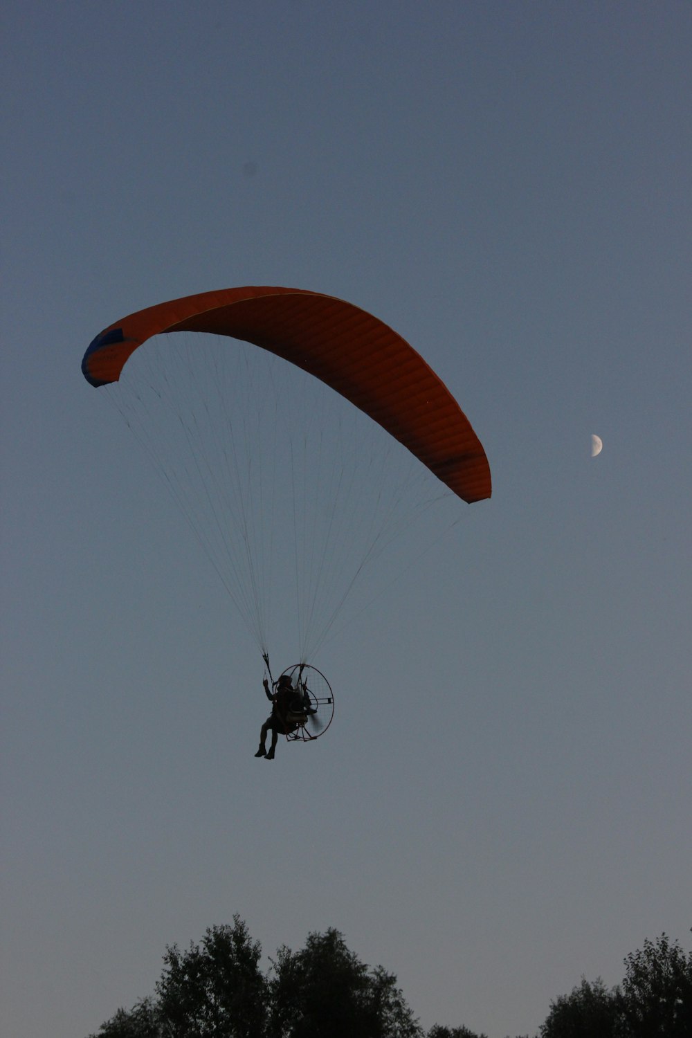 person doing parachuting