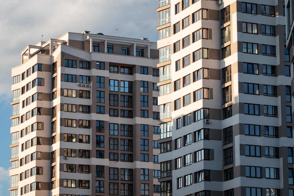 white and black concrete buildings at daytime