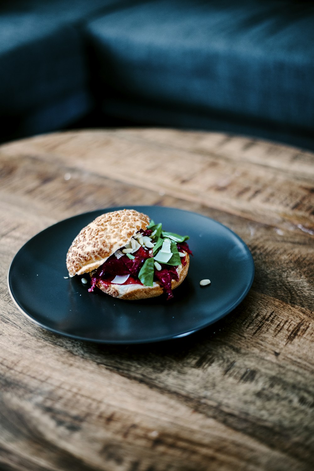 sliced food on round black ceramic plate