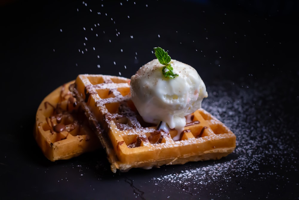 close-up photo of waffle with white ice cream