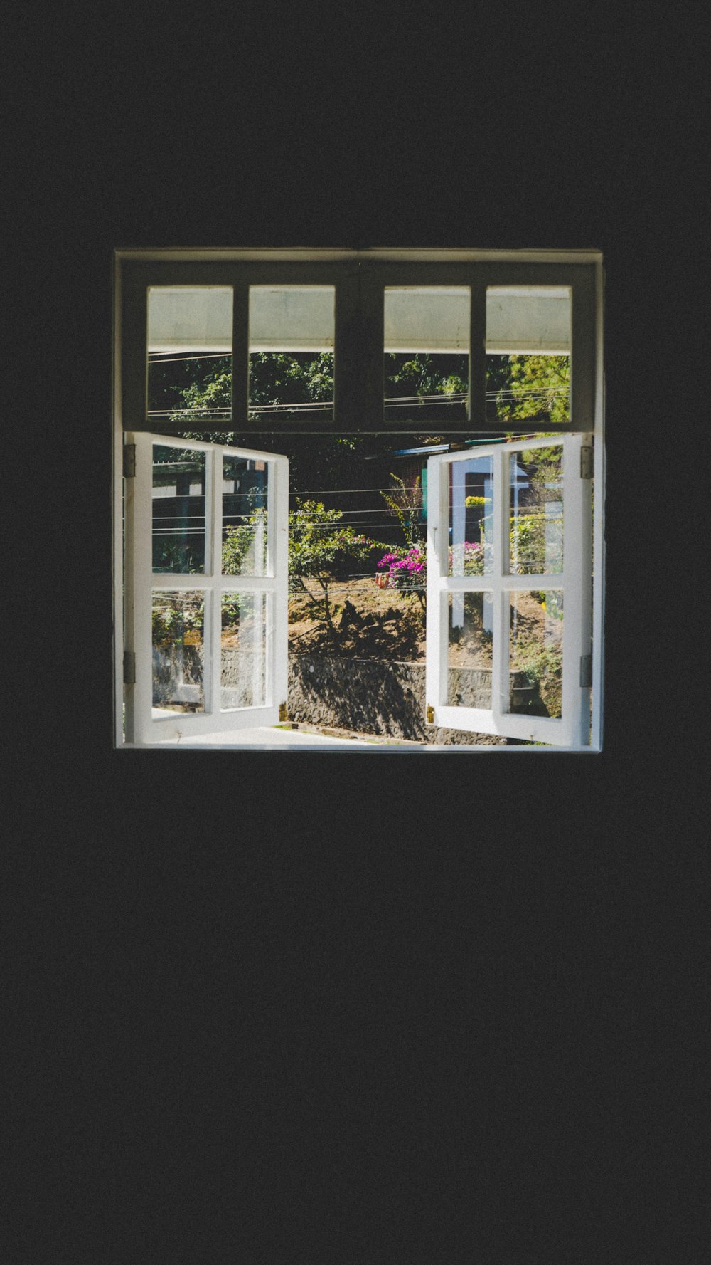 an open window in a dark room