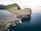 aerial photo of island near ocean during daytime