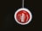 A red and white yo-yo with 'Coca-Cola' branding is suspended by a string against a dark background. The text around the yo-yo includes 'Professional' and 'Made in Bangladesh'.