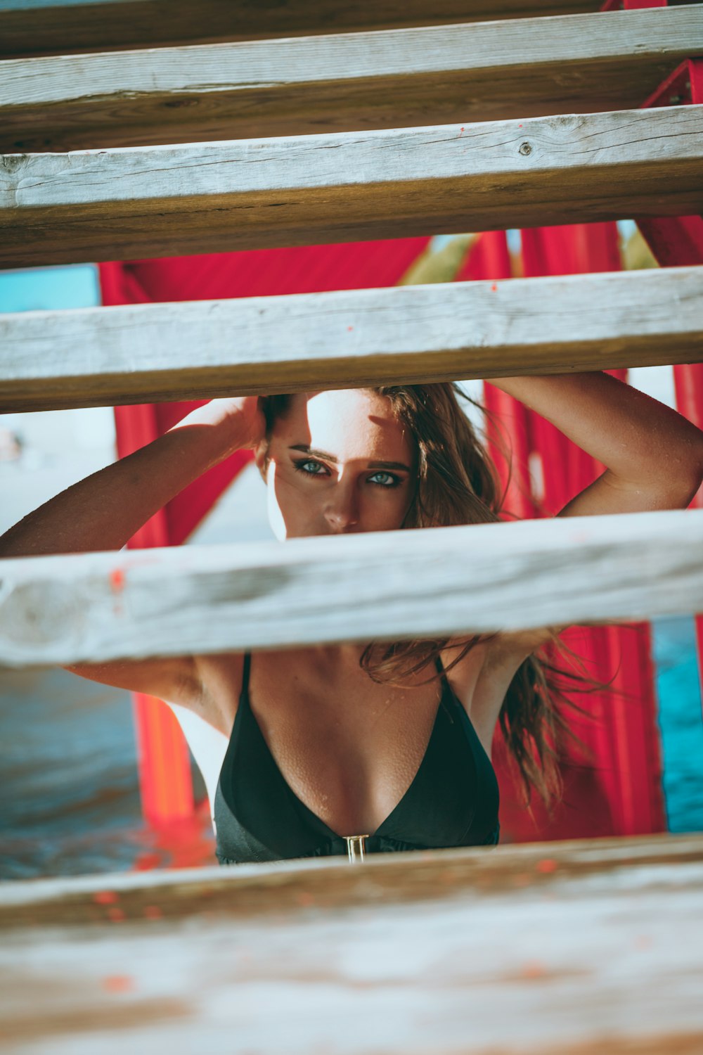 shallow focus photo of woman in black bikini top