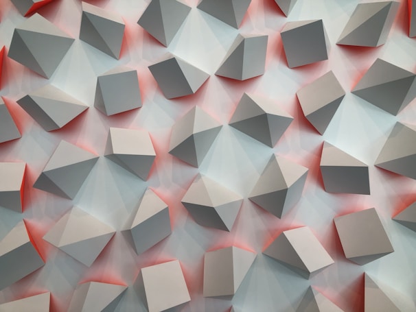 An ultra HD desktop wallpaper with a clean geometric pattern in muted tones.