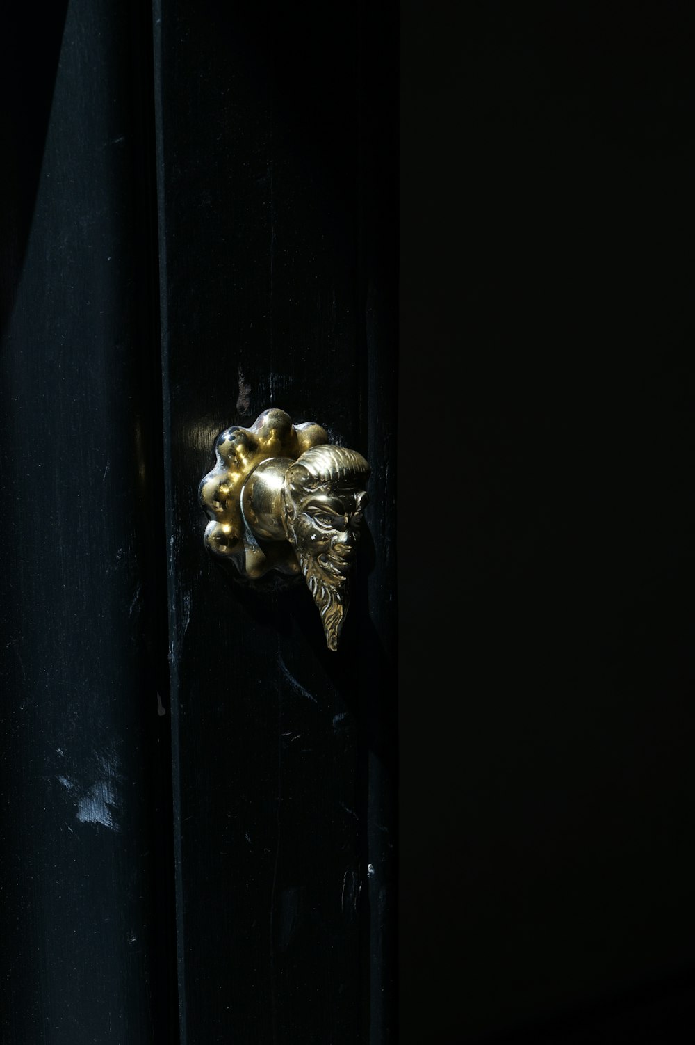 gold-colored door handle