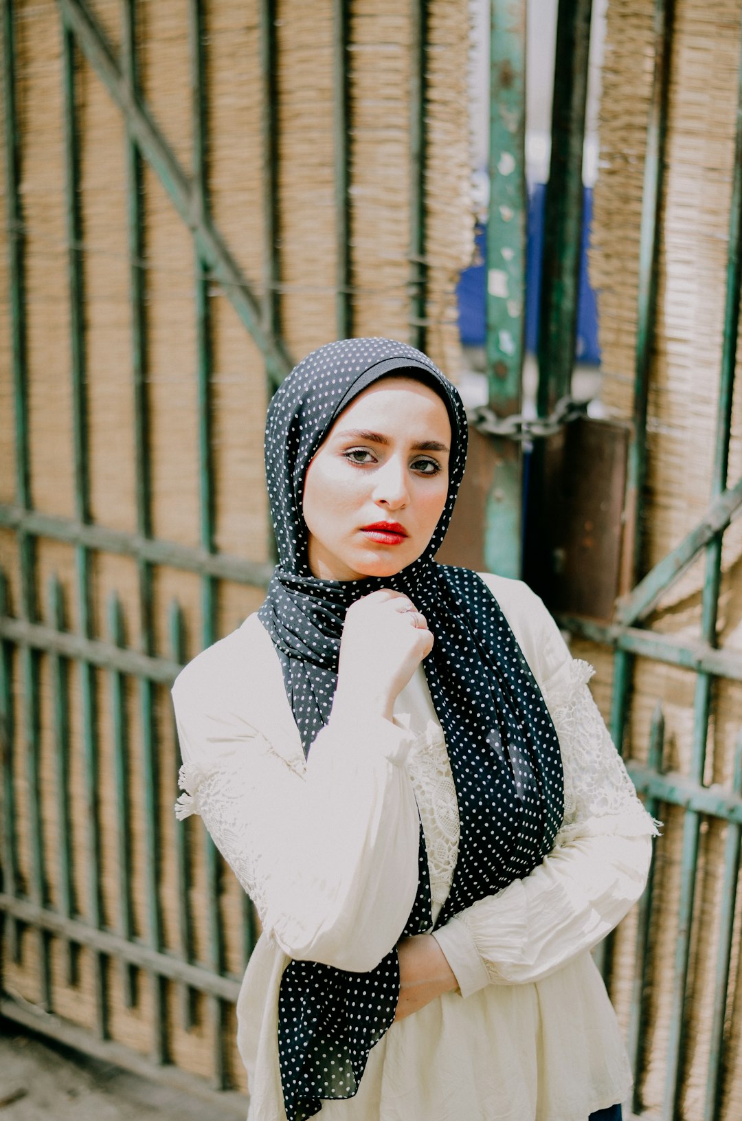 women wearing a black polka dot hijab during daytime