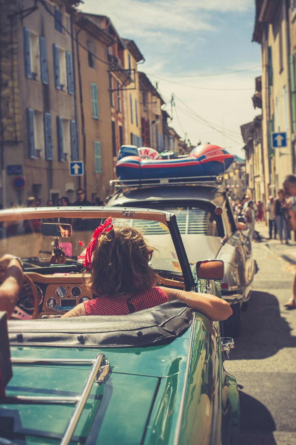 woman in convertible coupe