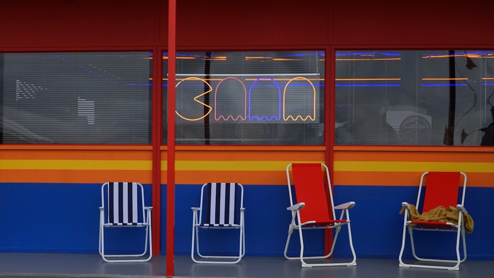 two red and two blue chairs