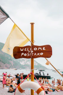 welcome to positano sign