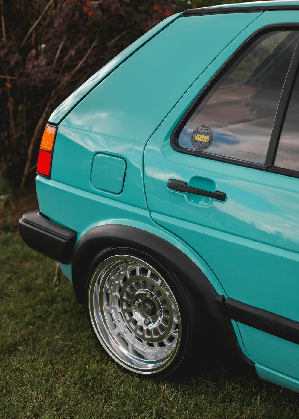 teal 5-door hatchback