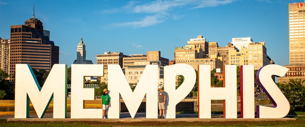 two person standing on memphis wall