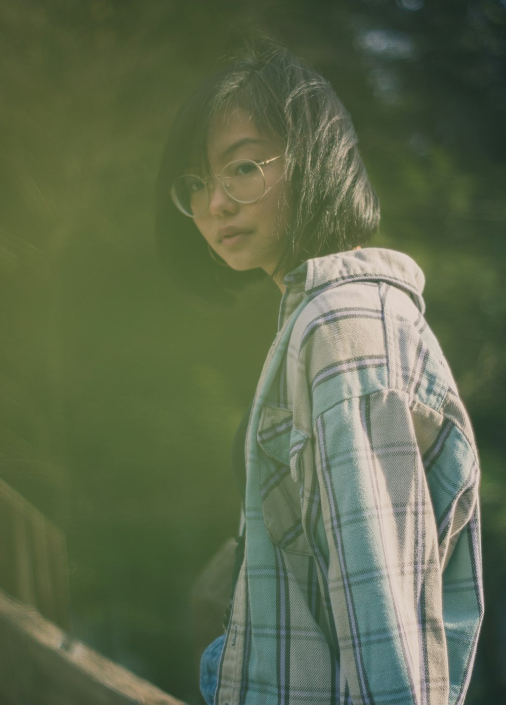 woman wearing white and blue plaid sport shirt