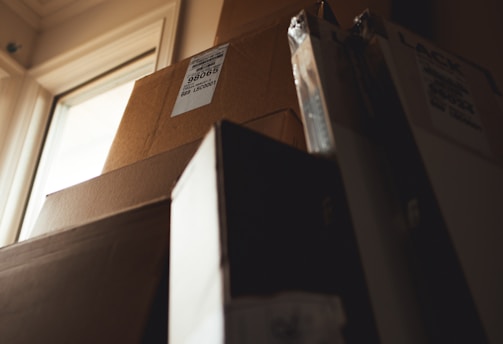 boxes leaning on cardboard box