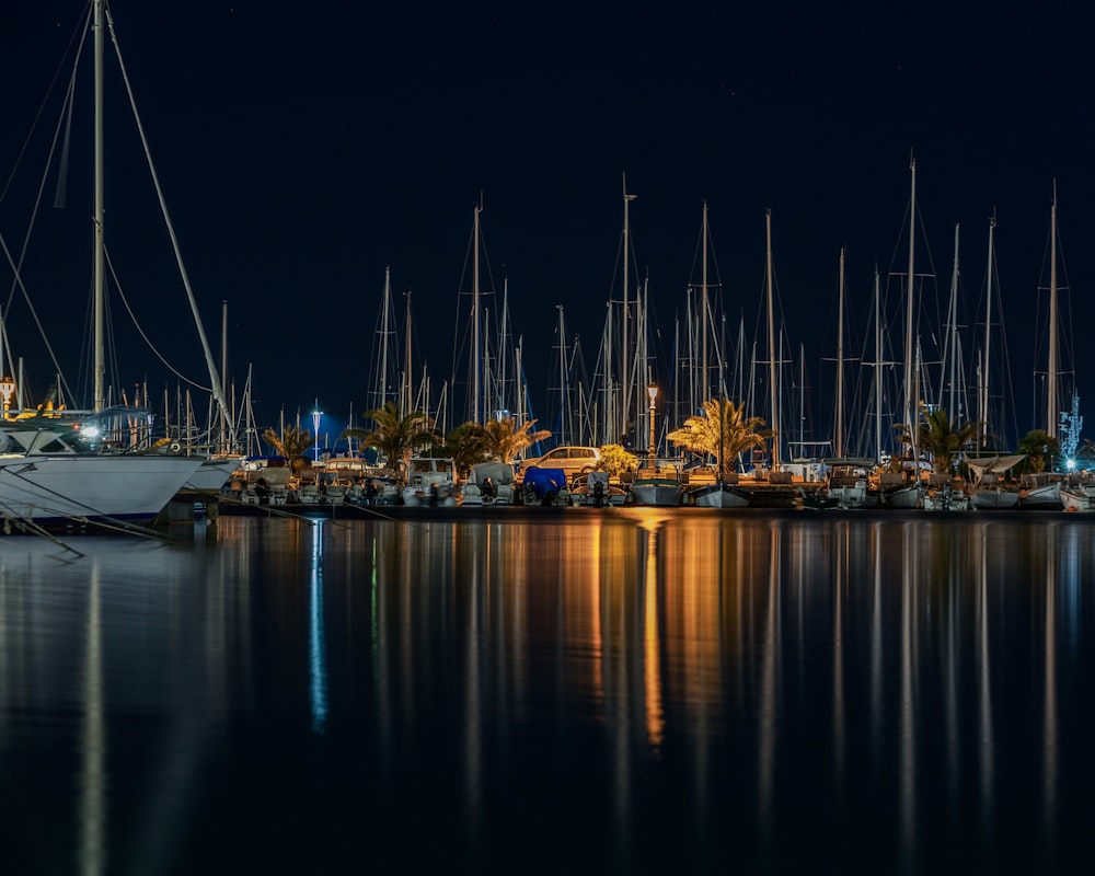 boats on harbor during night