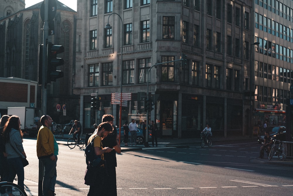 people standing near post