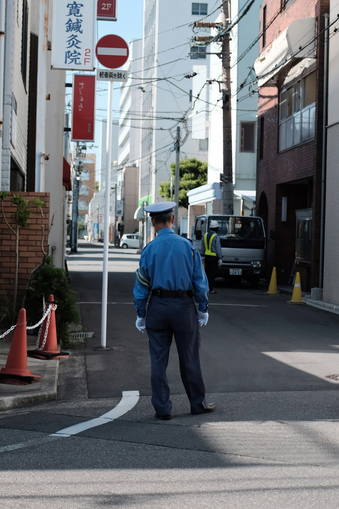 man wearing blue police suit