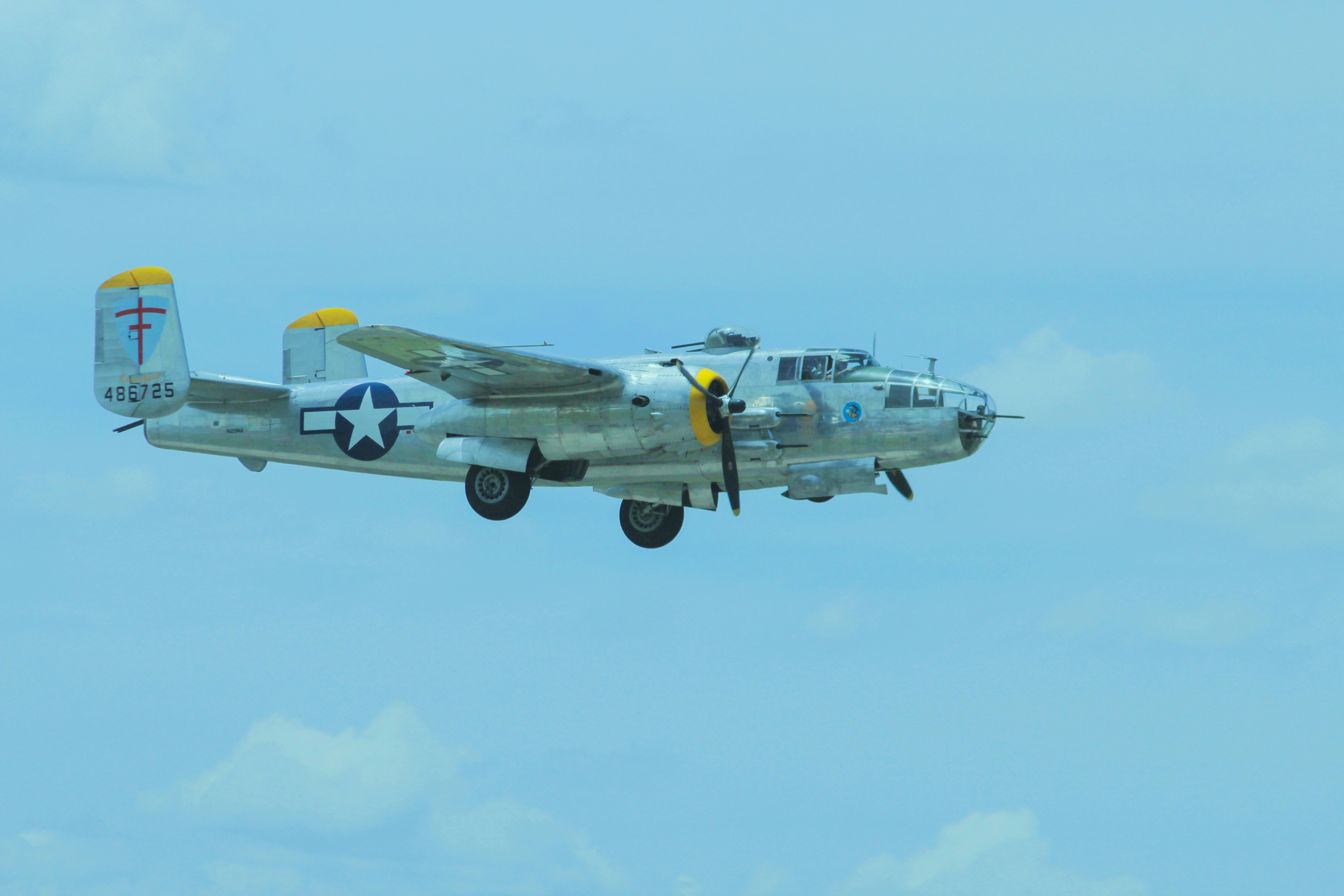 gray and blue airplane in flight during daytime, Mitchell