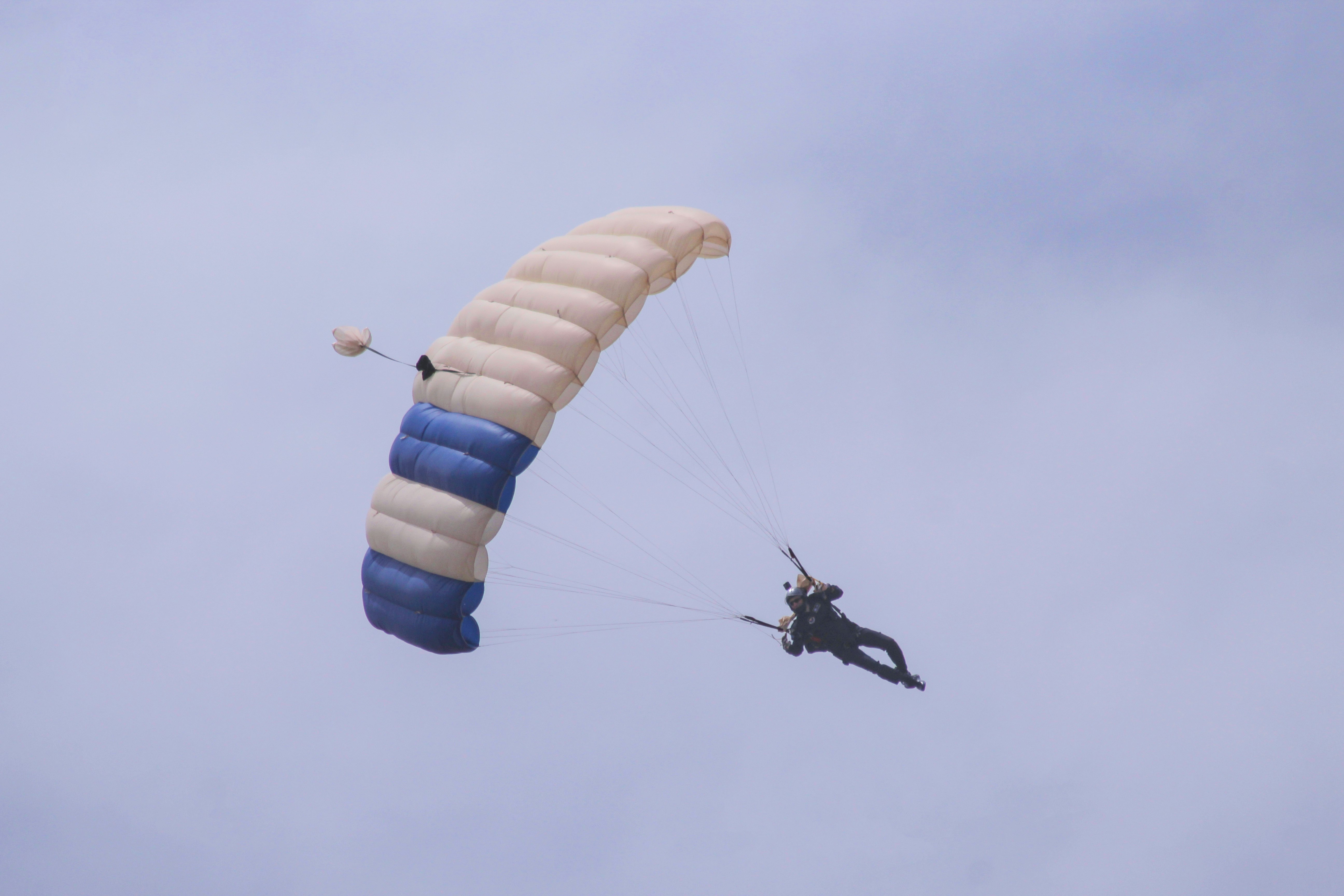 man doing paragliding