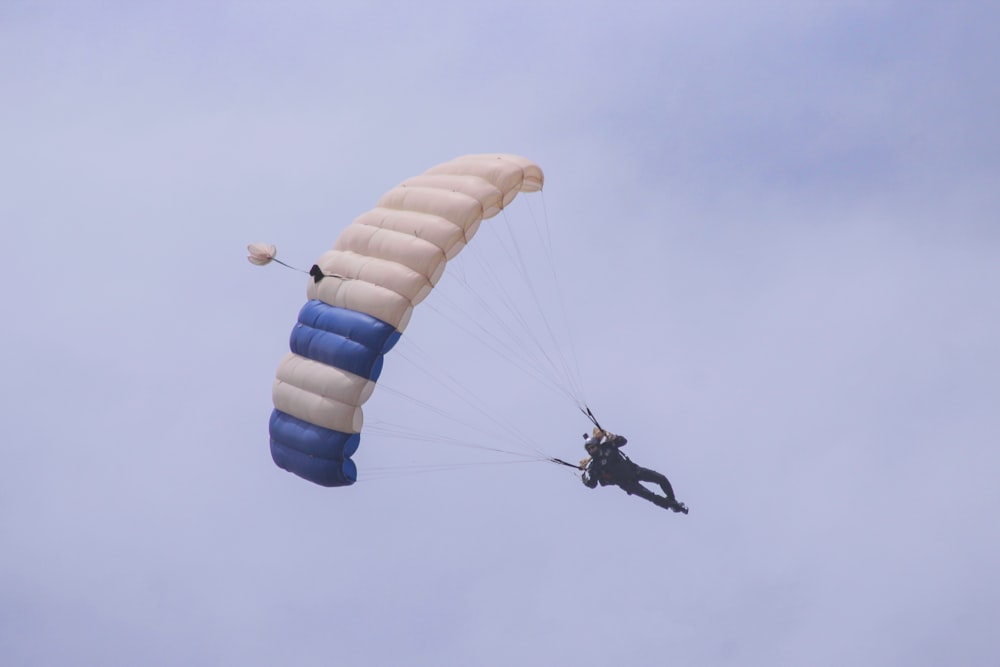 man doing paragliding