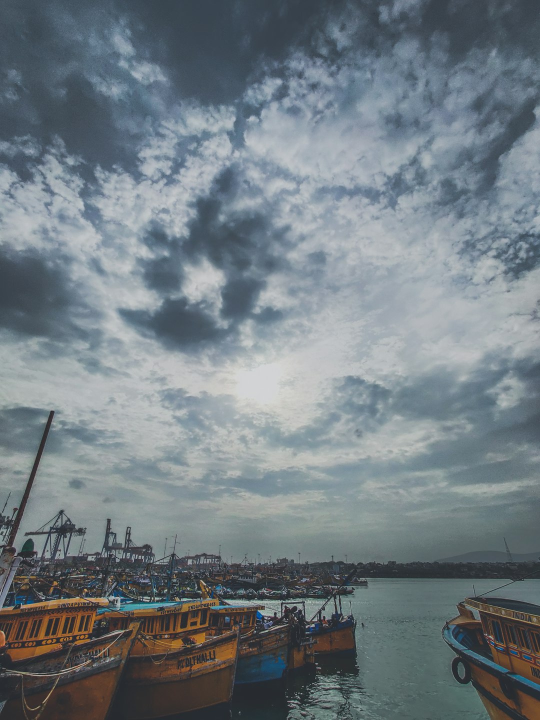 boats on calm body of water