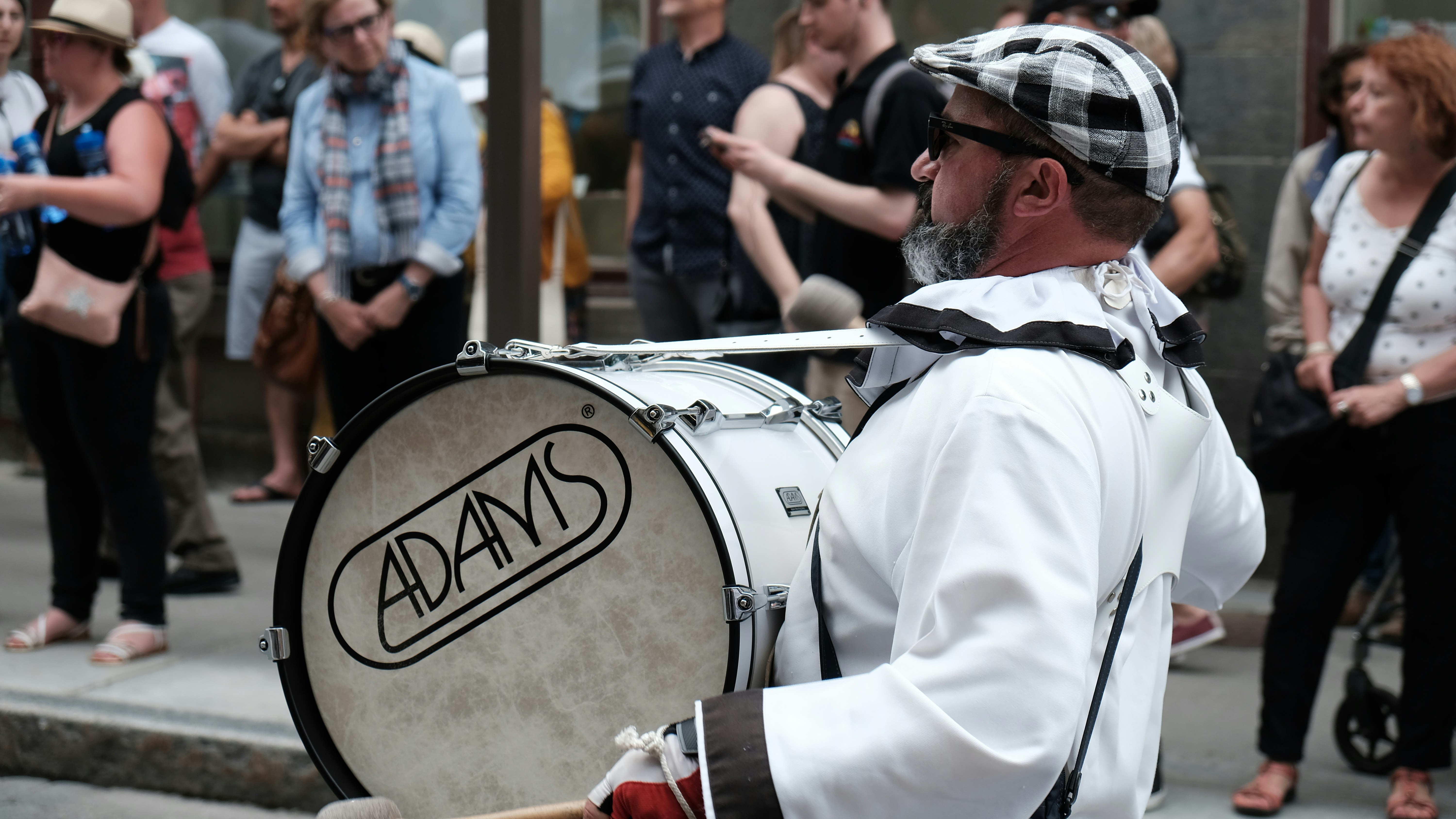 man holding drum during daytime