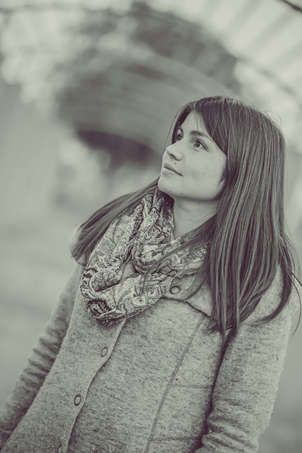 grayscale photography of woman in coat