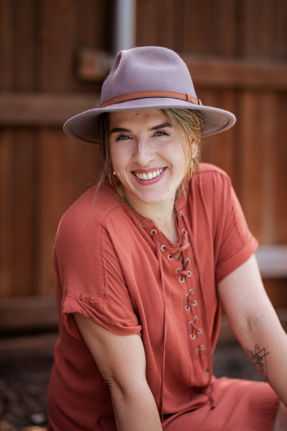 smiling and sitting woman