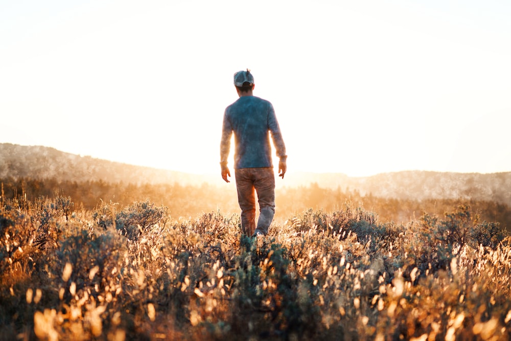 man standing on grass