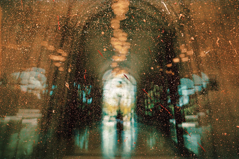 a blurry photo of a person walking down a hallway