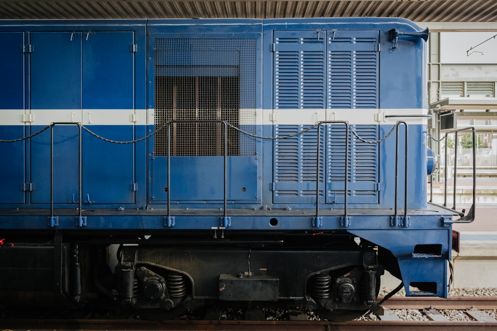blue train on track