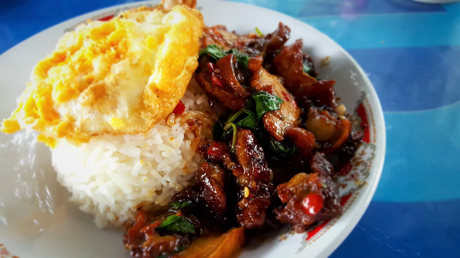 Thai rice dish with a fried egg.