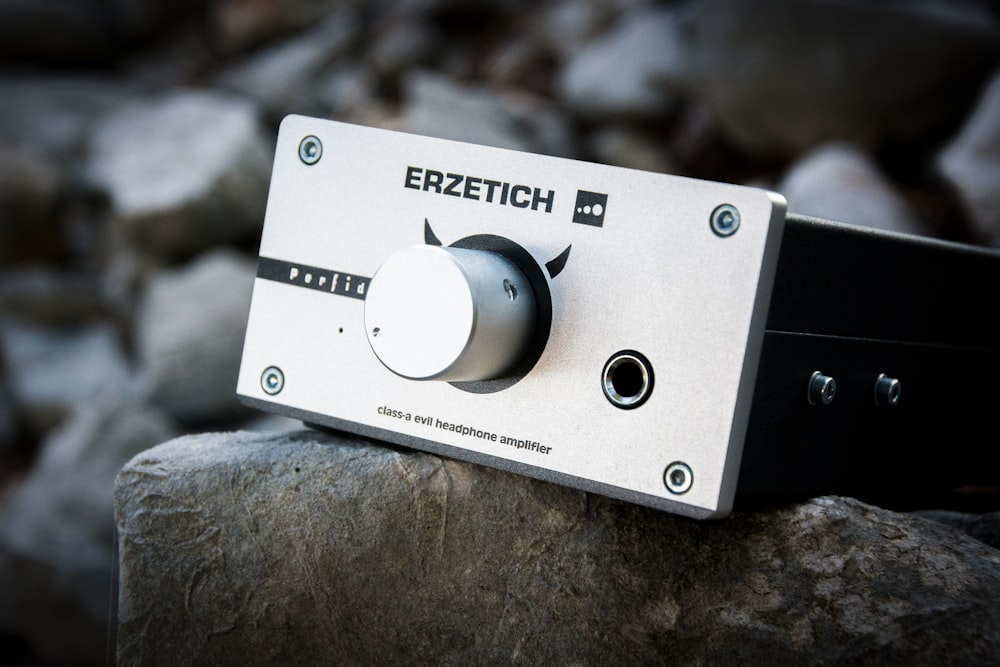 silver and black Erzetich electronic console