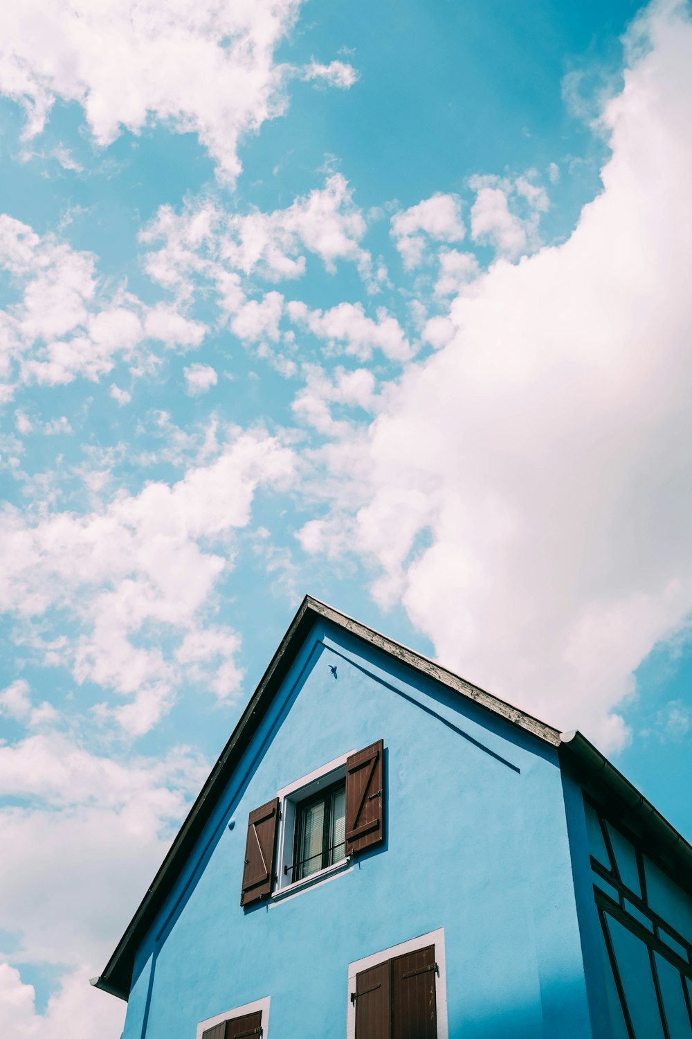 blue house and white clouds