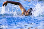 man swimming-subtitle-Add Cardiovascular Workout-topic-How to Get Lean Mass Body