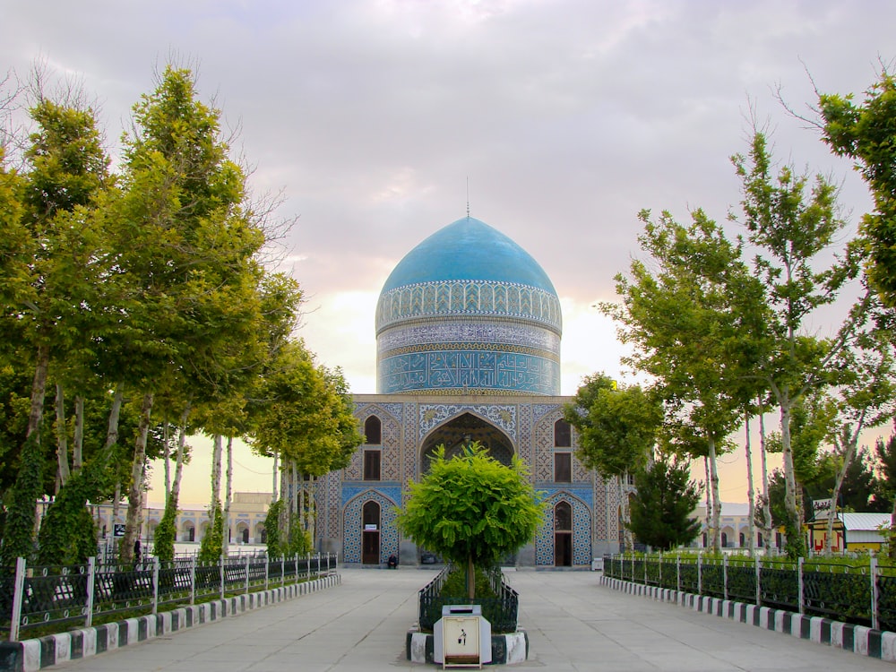 blue temple beside trees