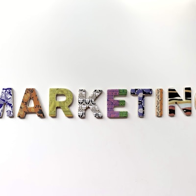 multicolored marketing freestanding letter