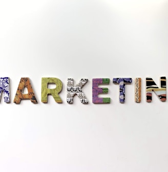 multicolored marketing freestanding letter