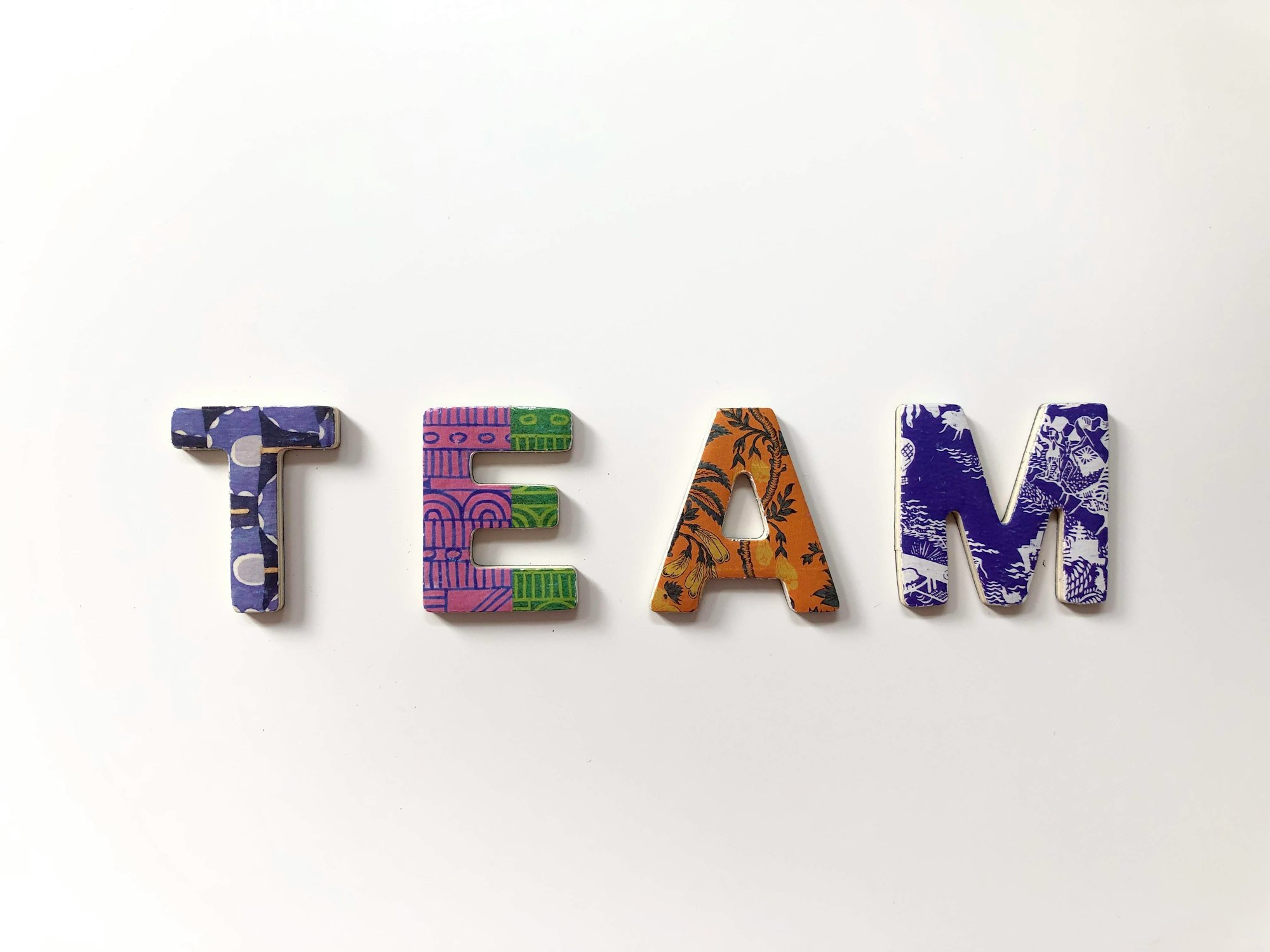 Team in Colorful Alphabets