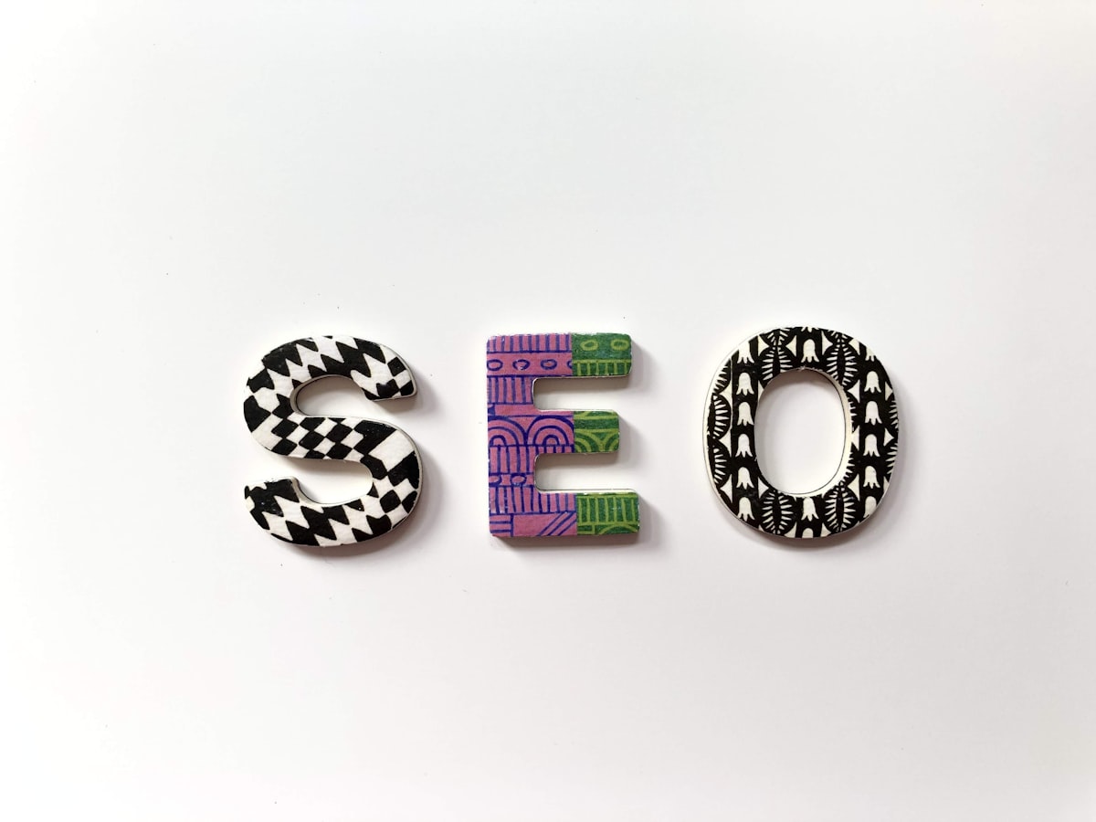 Letter tiles spelling SEO, representing search engine optimisation strategy