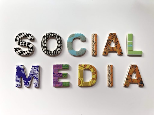Arranged alphabetically, letters spell the words 'SOCIAL MEDIA', each letter featuring different colors and patterns on a white background.