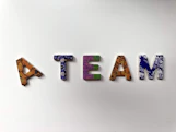Lettre  faisant le mot A TEAM pour montrer l'esprit d'équipe