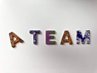 assorted-color A Team text wall decor